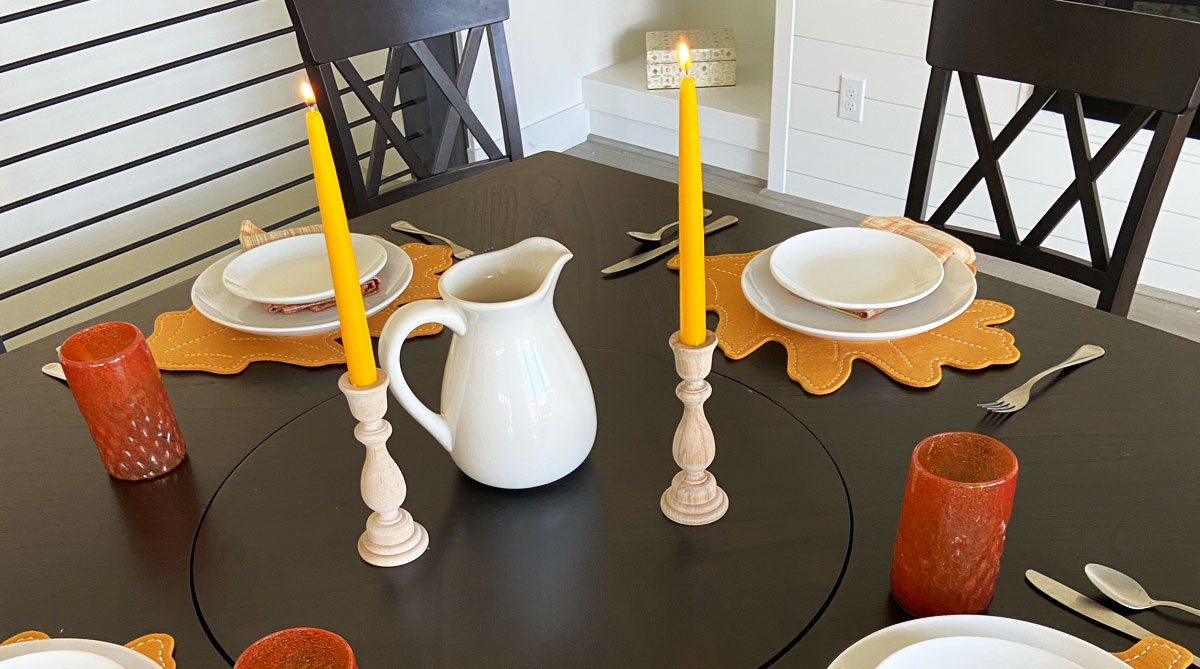Gold Leaf Taper Candles and Chargers with orange glasses