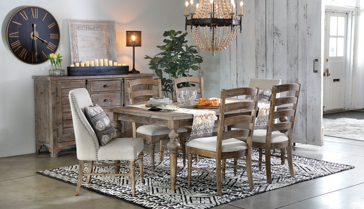 Distressed warm toned light brown dining set in boho dining room