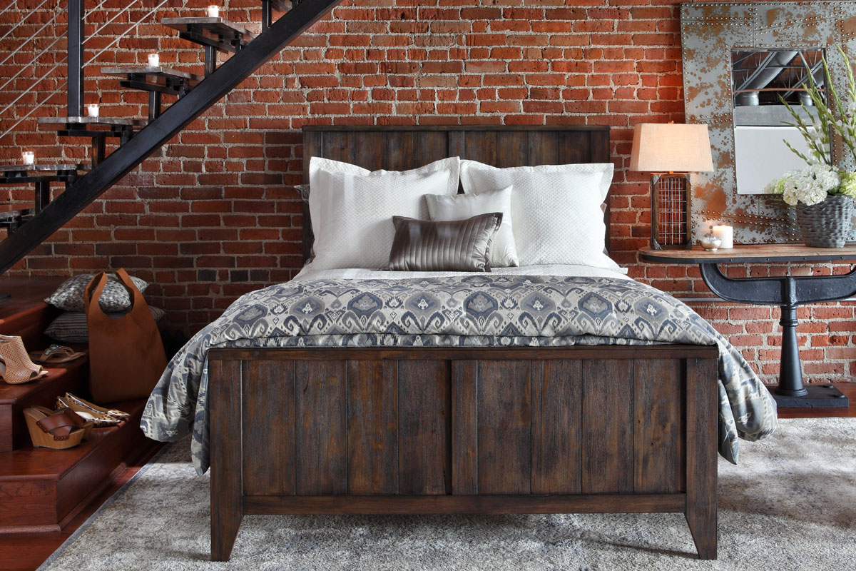 Brown Wooden Panel Bed in Industrial Styled Red Brick Loft